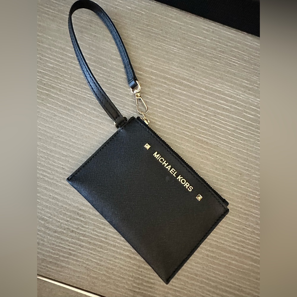 Michael Kors wristlet. Never used.